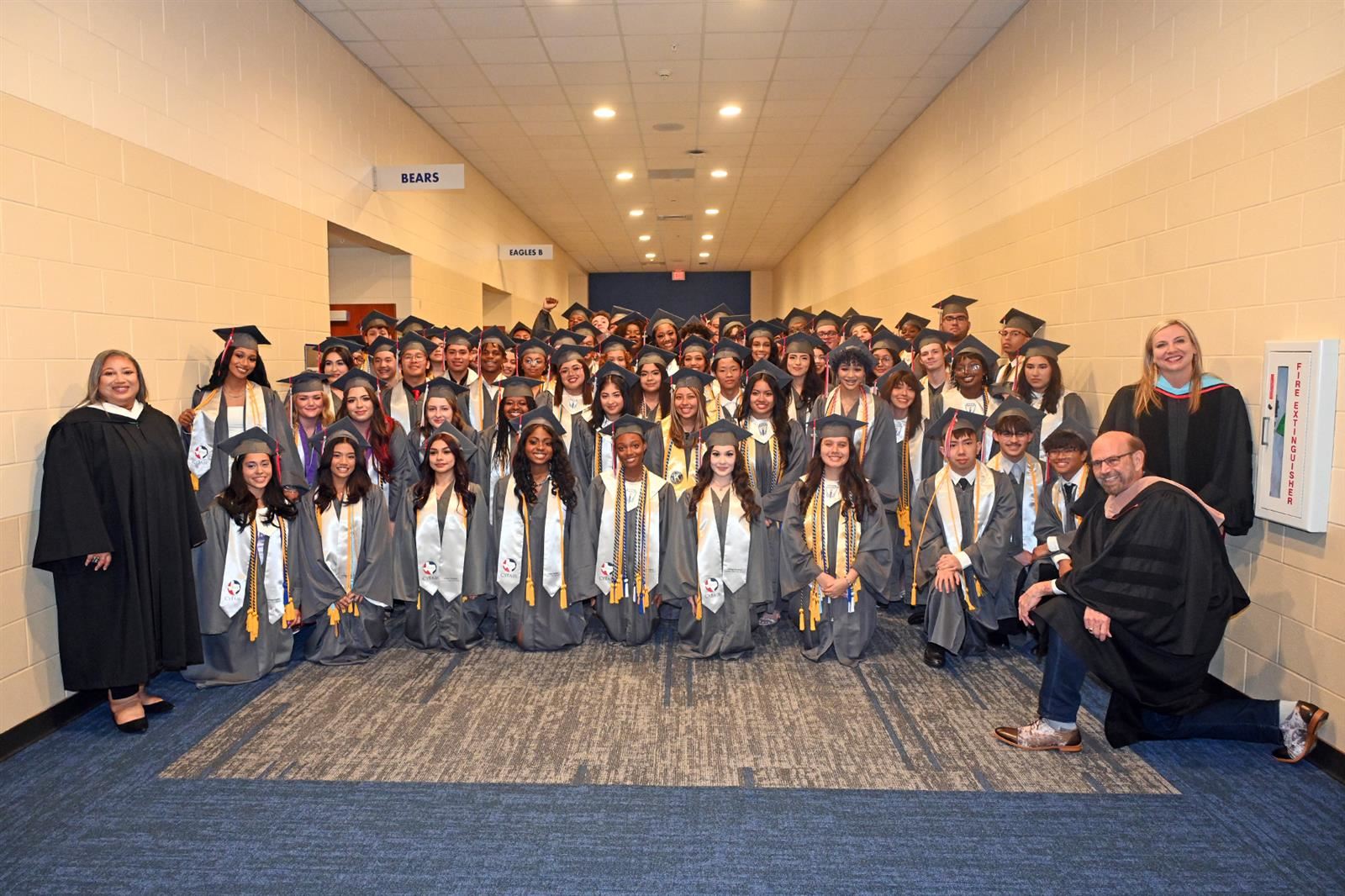 Cypress Lakes High School College Academy graduates pose for a photo before their commencement ceremony on May 23.